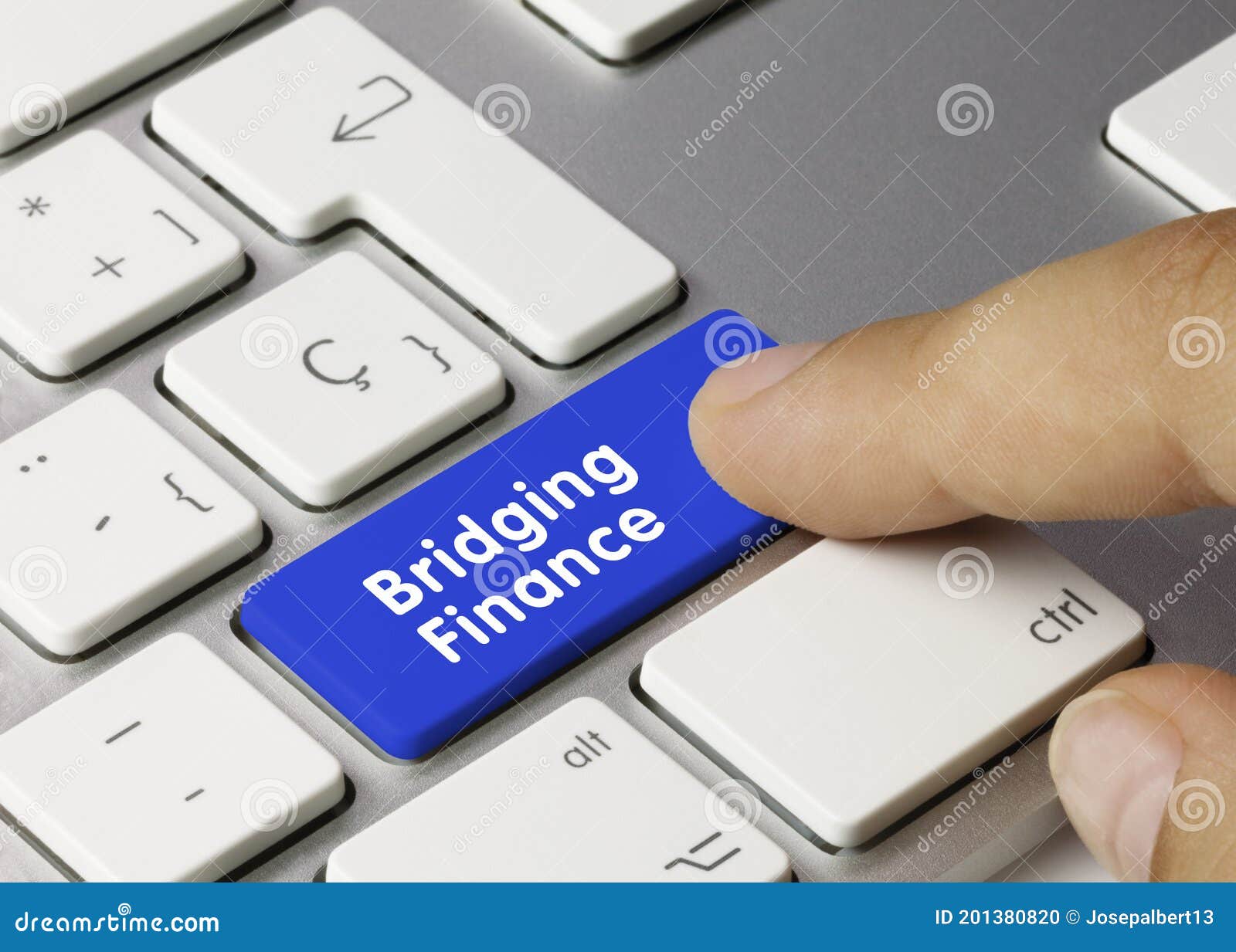 bridging finance - inscription on blue keyboard key