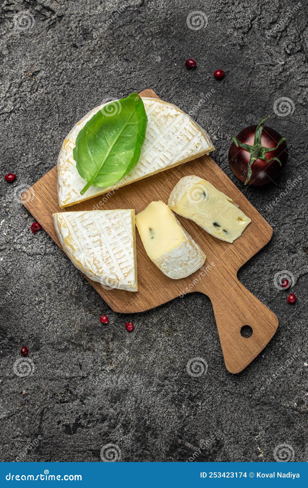 Brie Cheese with a White and Blue Mold, Camambert Cheese. Truffled Brie Cheese, Vertical Image