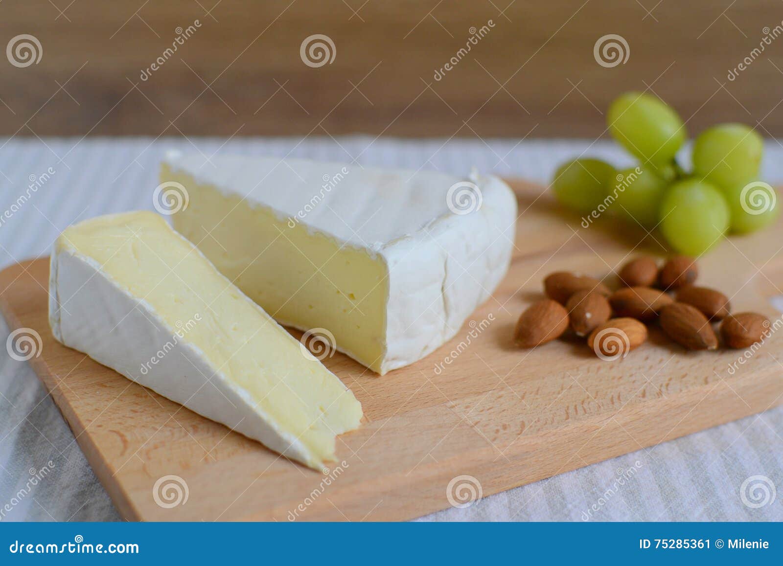 Brie Cheese in Wooden Plate Stock Image Image of dairy, almond 75285361