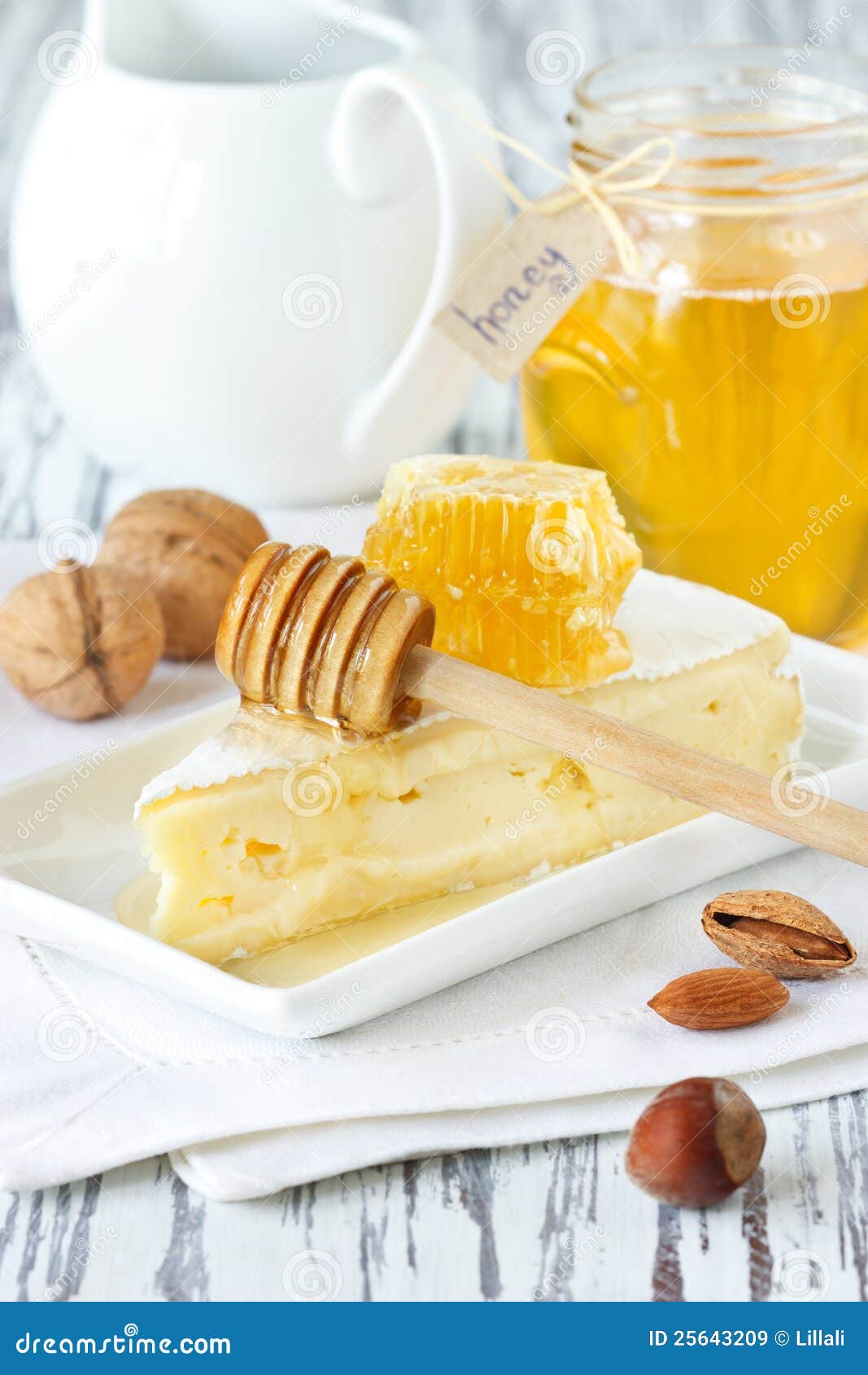 Brie and honey. stock image. Image of cheese, linen, 25643209