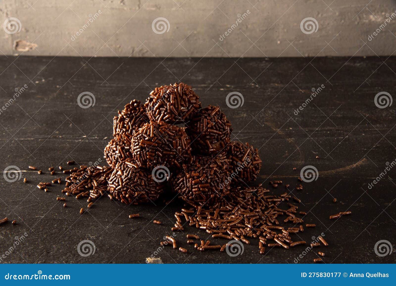 brigadeiro (brigadeiro) traditional brazilian sweet. chocolate candies on dark background