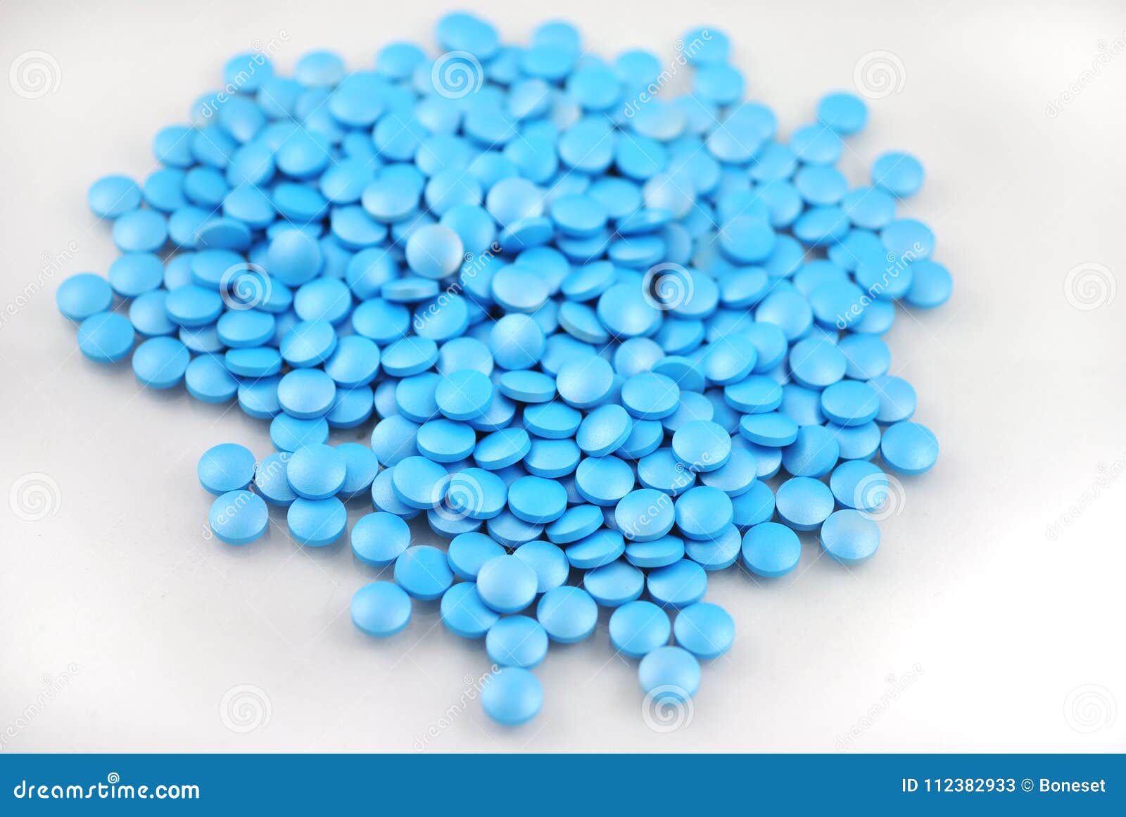 Bright blue round tablets stock image. Image of blisters 112382933