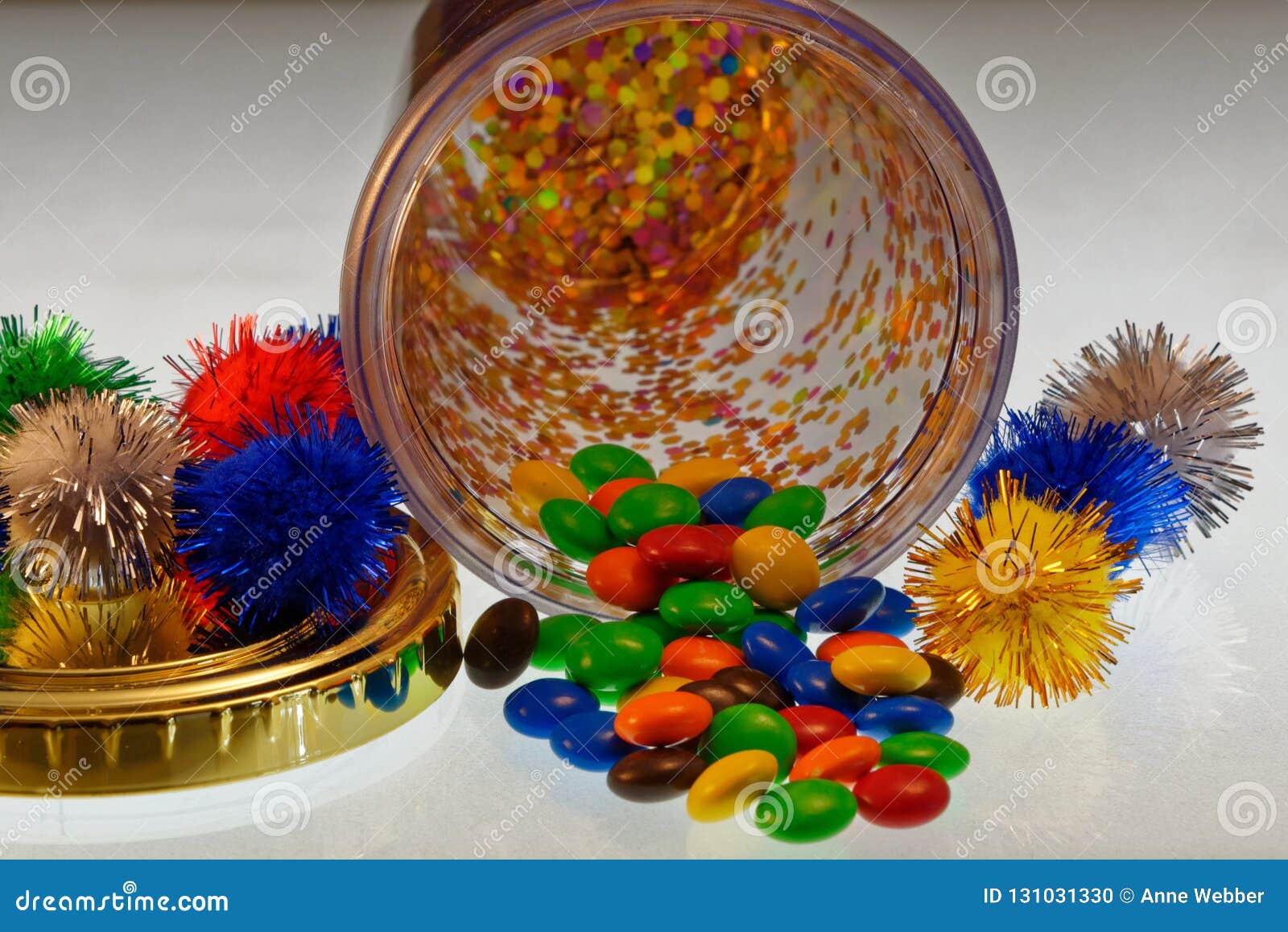 Party Fun, Chocolate Treats Spill of a Container with Bright, Decorative Pom Poms Stock Photo - Image of birhtdays, cheerful: 131031330