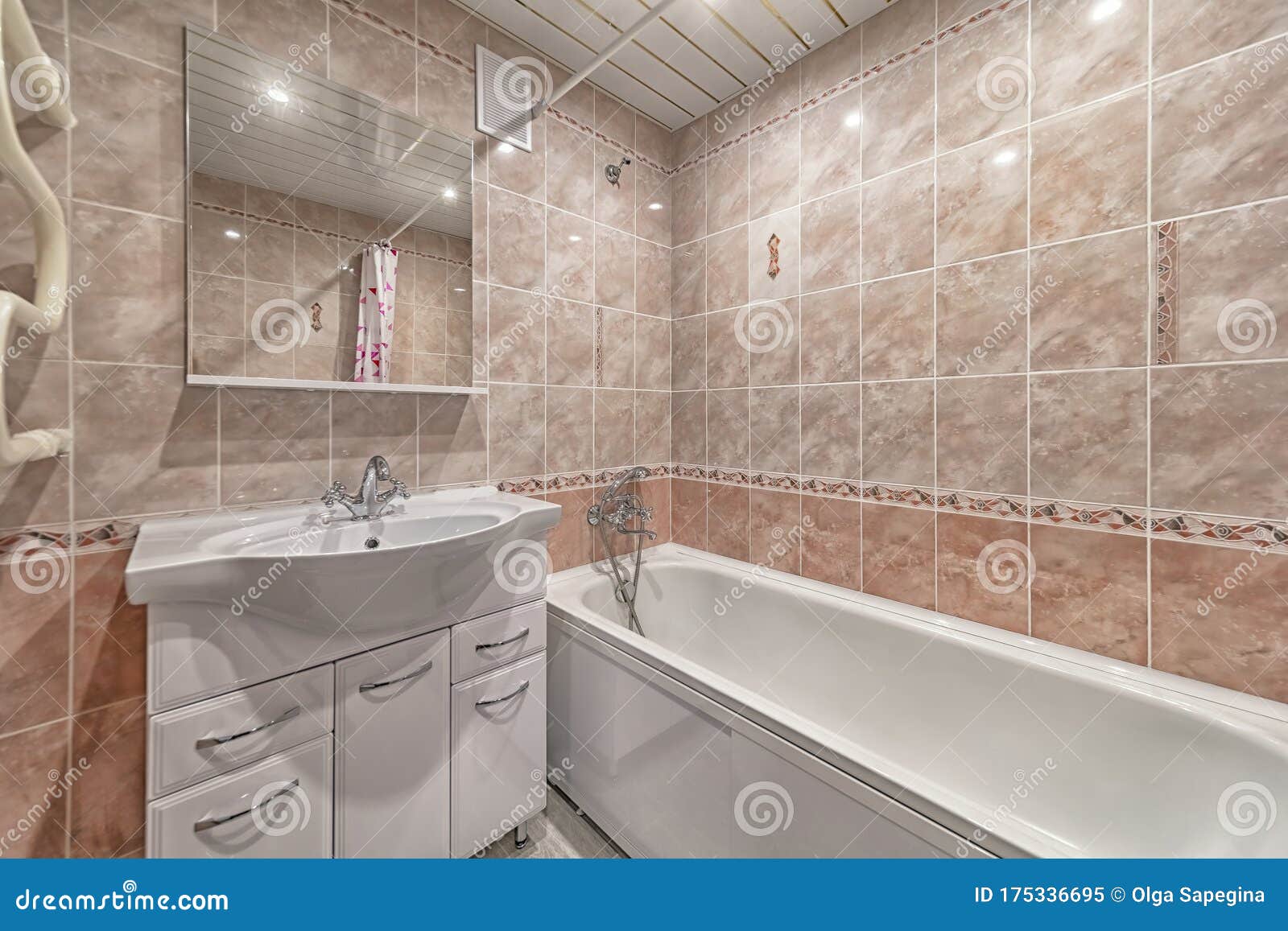 Small Beige  Tile Bathroom  With Bath Tube  Stock Image 