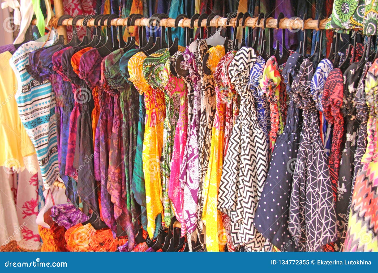 Bright Colored Children`s Dresses or Sarafans Hang on Hangers and are ...