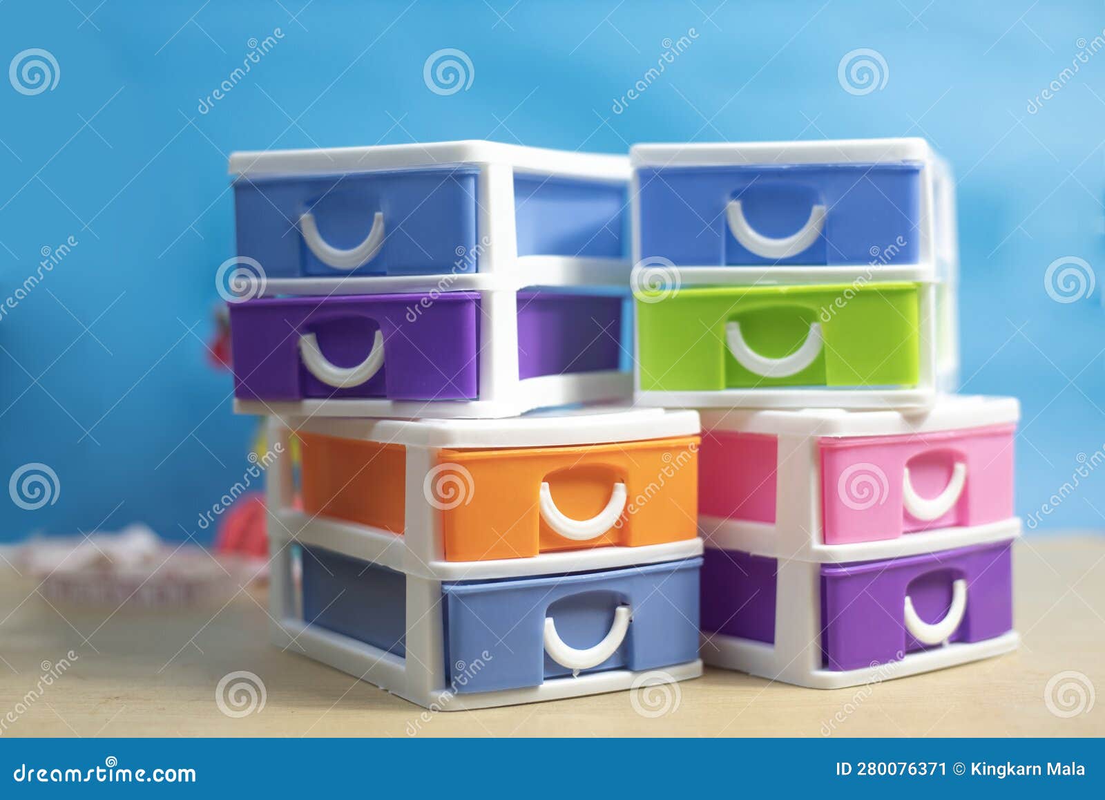 Bright Colored Plastic Drawers, Blue Wall Face Stock Illustration