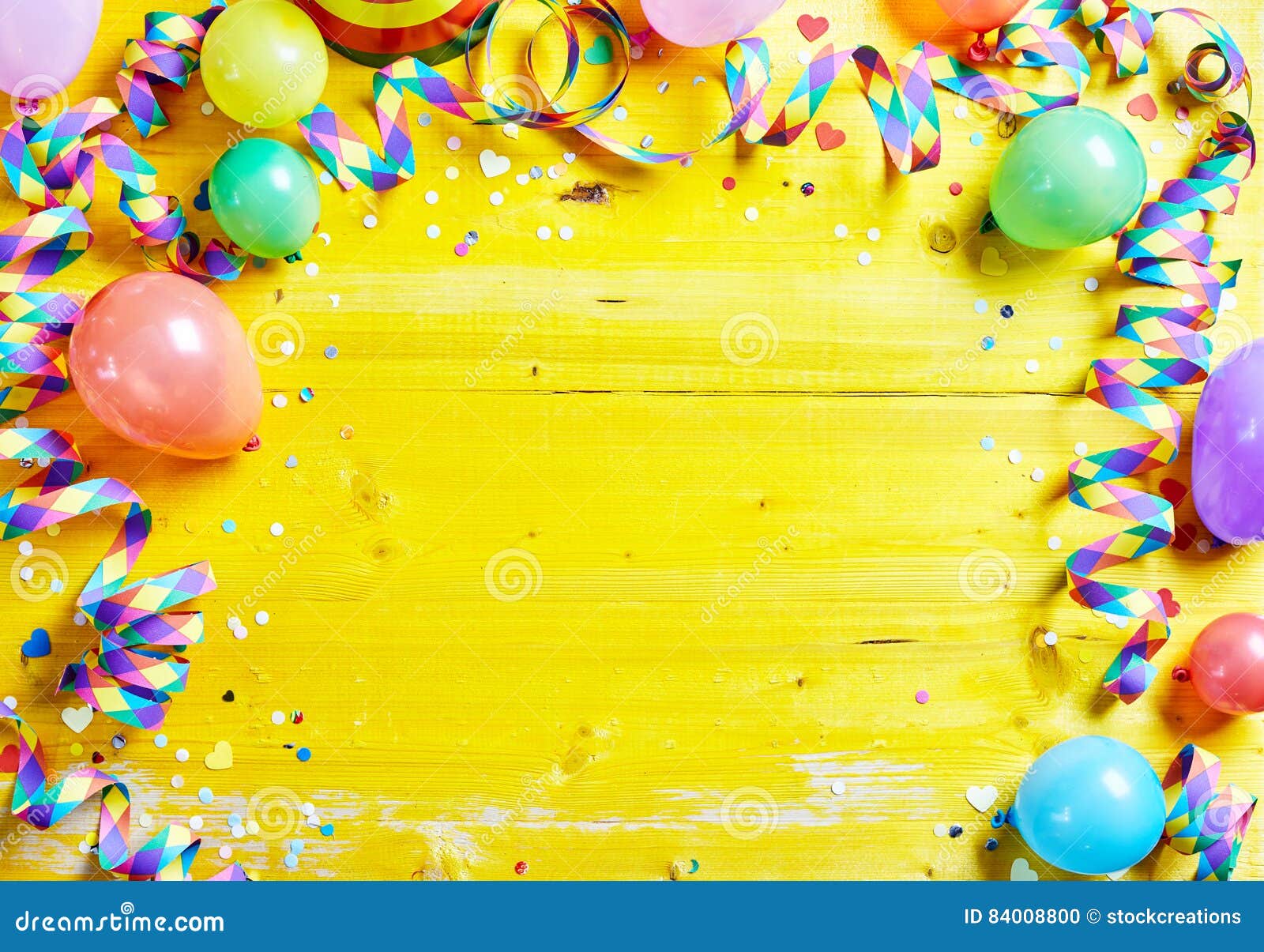 bright colorful carnival or party frame on yellow