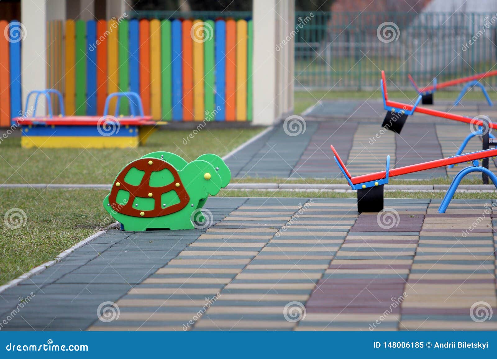 Bright Colorful Funny Bench On Nursery Playground With Soft Rubber