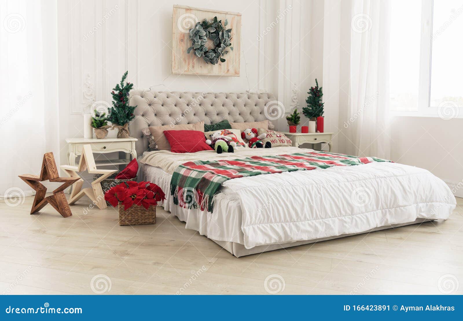 bed in between two windows