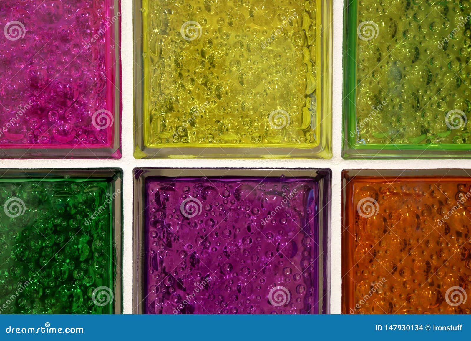 Bright glass blocks wall stock photo. Image of mosaic 147930134