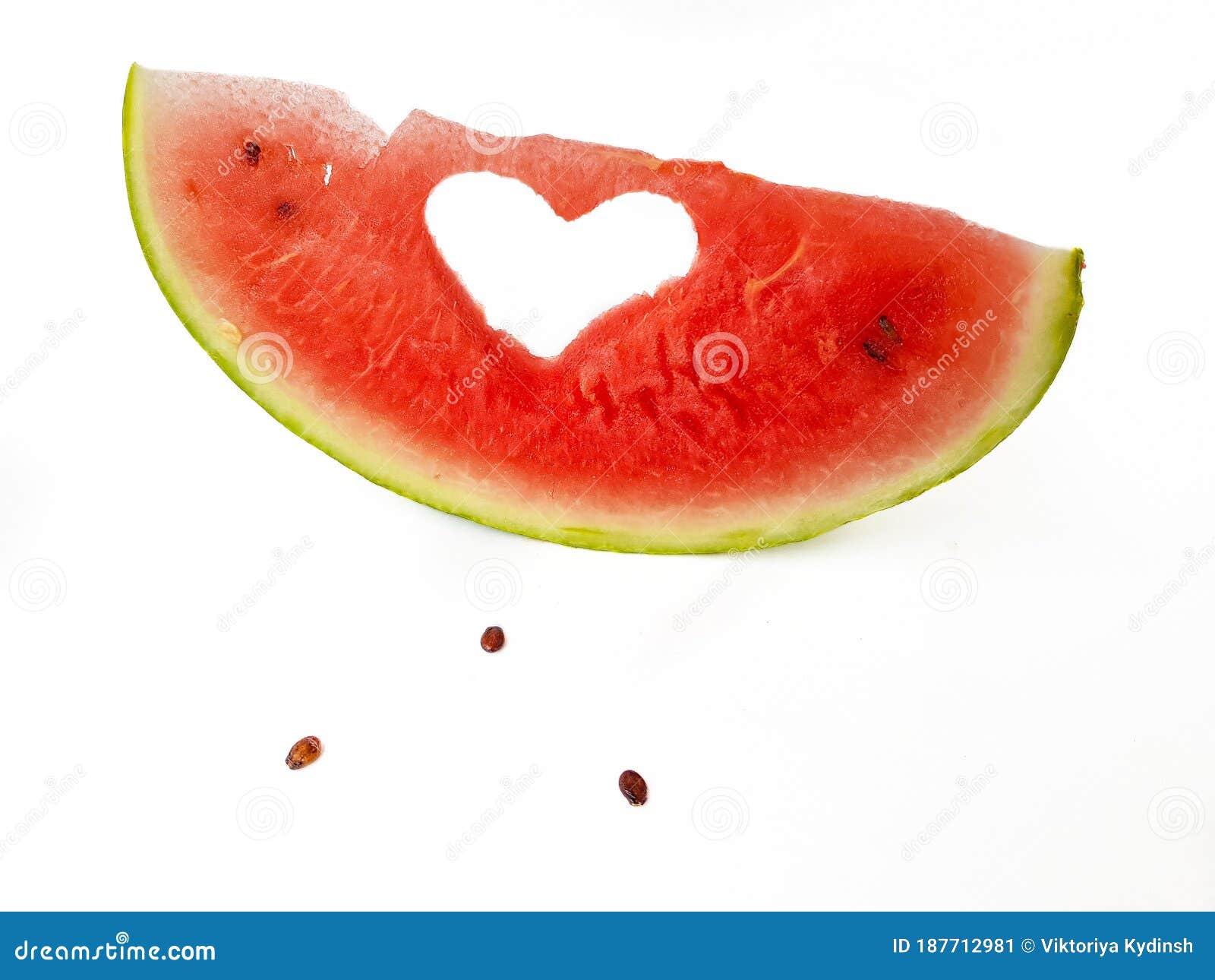 bright juicy red watermelon in the form of a heart. space for text.