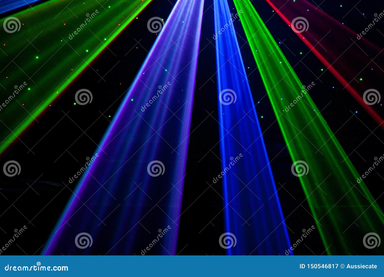 bright nightclub red, green, purple, white, pink, blue laser lights cutting through smoke machine smoke making light patterns
