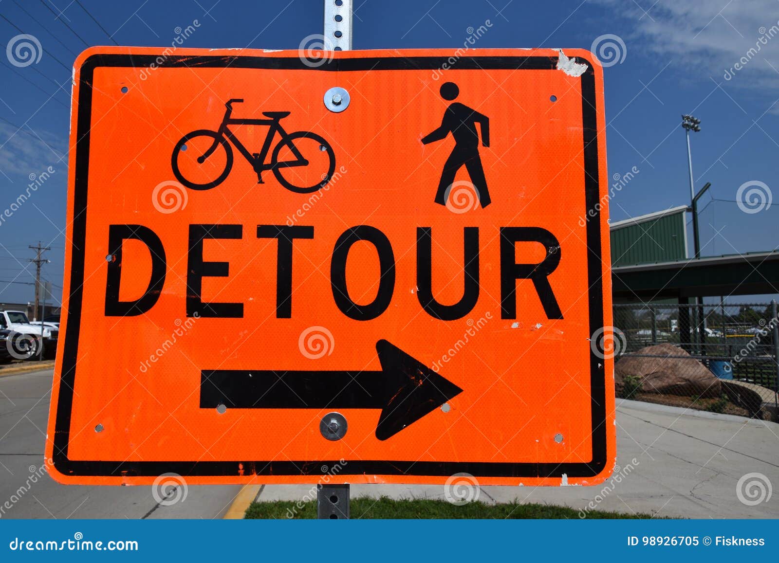 detour sign instructs bikers and walkers