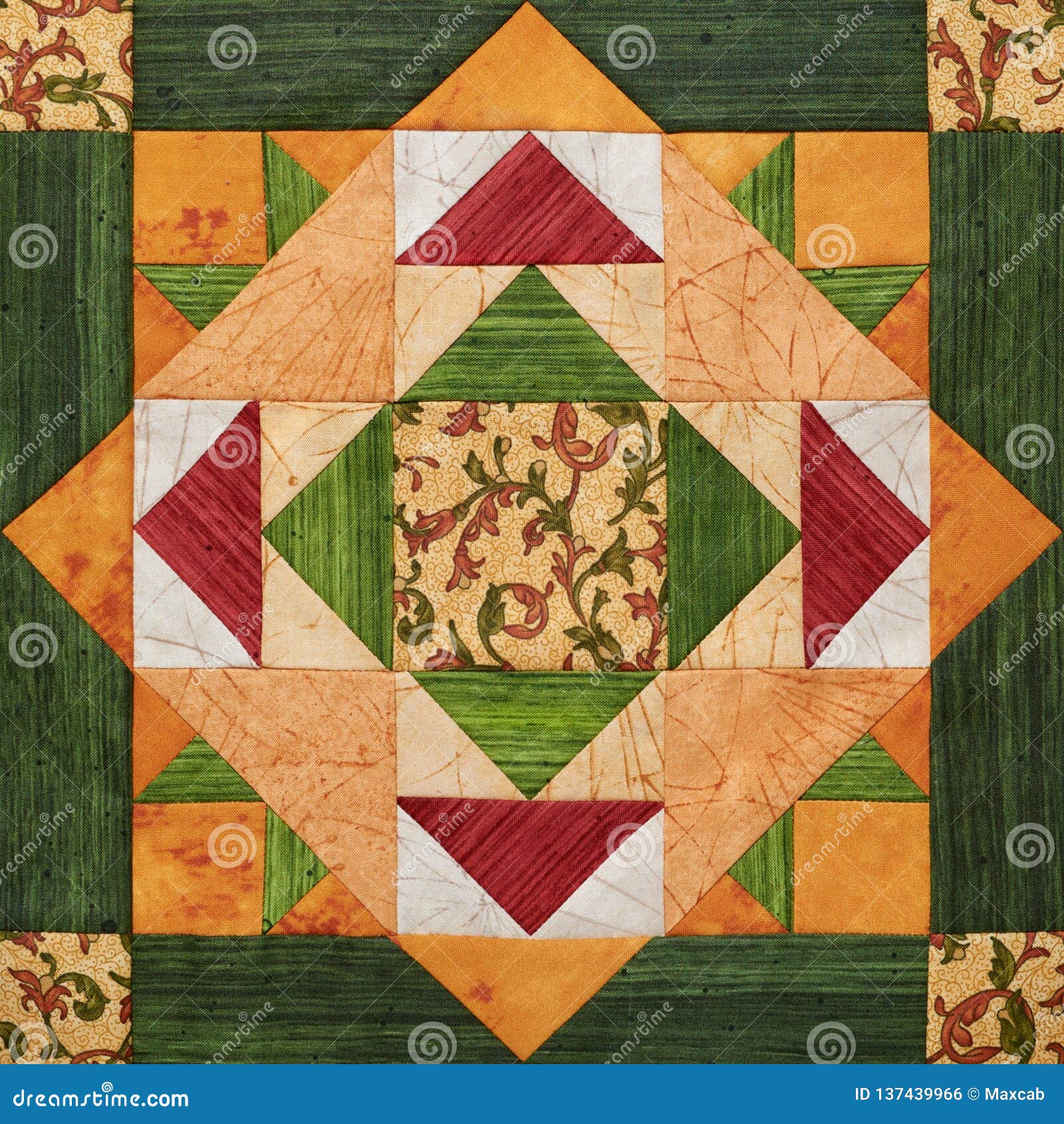 bright orange-green geometric patchwork block from pieces of fabrics