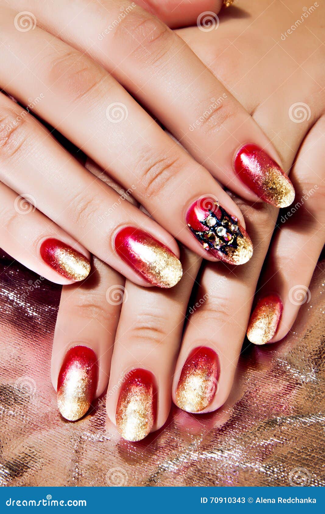 Bright Red and Gold Polish on Nails Stock Image - Image of