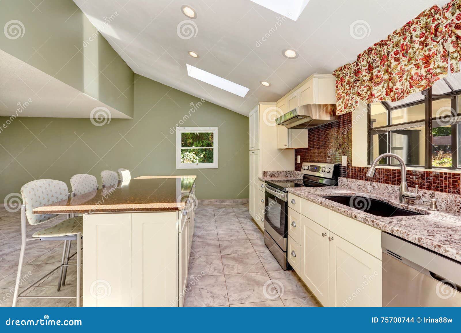 Bright Sunny Kitchen With Vaulted Ceiling And Skylights Stock