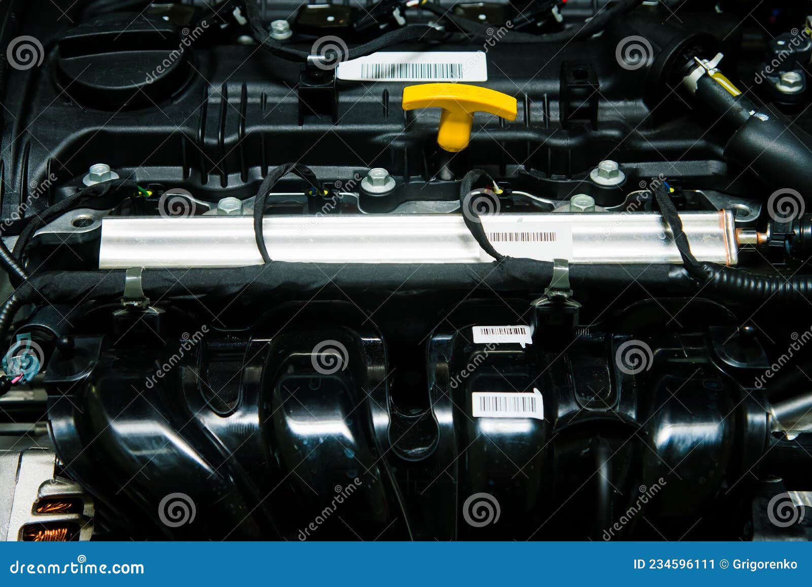 Yellow Oil Dipstick In Car Engine Measuring Level Of Engine Oil Yellow Oil Dipstick In Car Engine Measuring Level Of Engine Oil