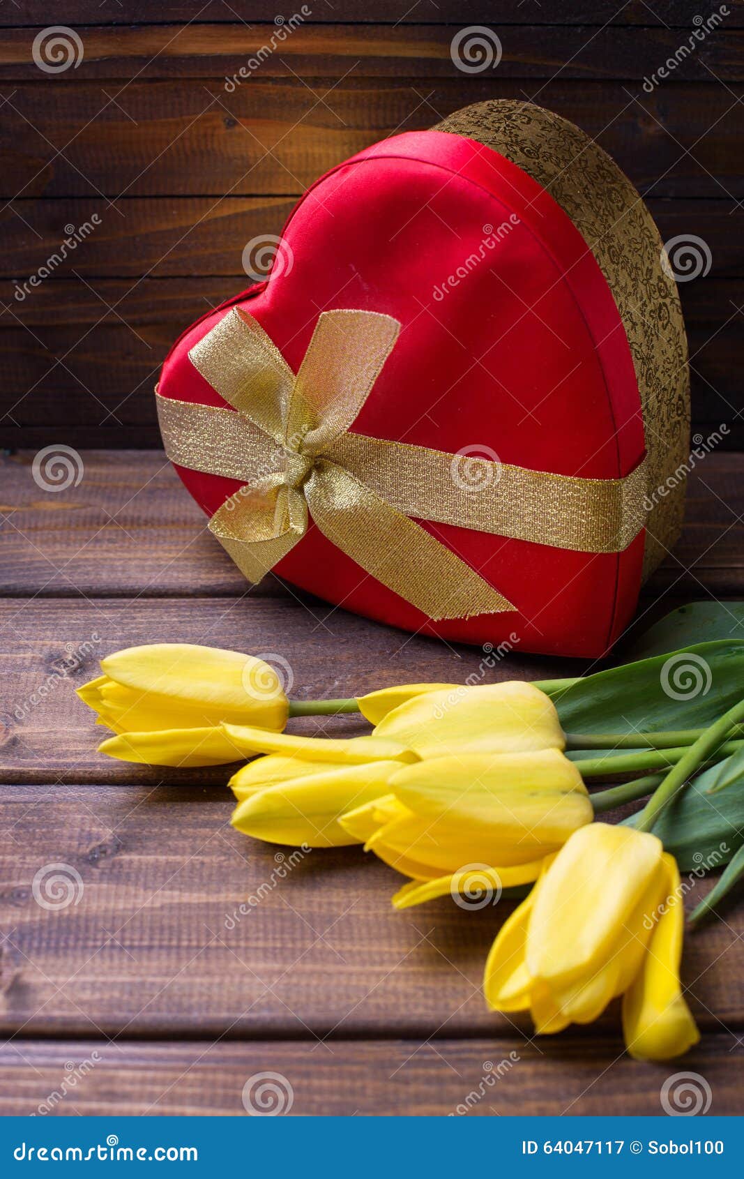 Bright Yellow Flowers Tulips And Festive Gift Box In Form