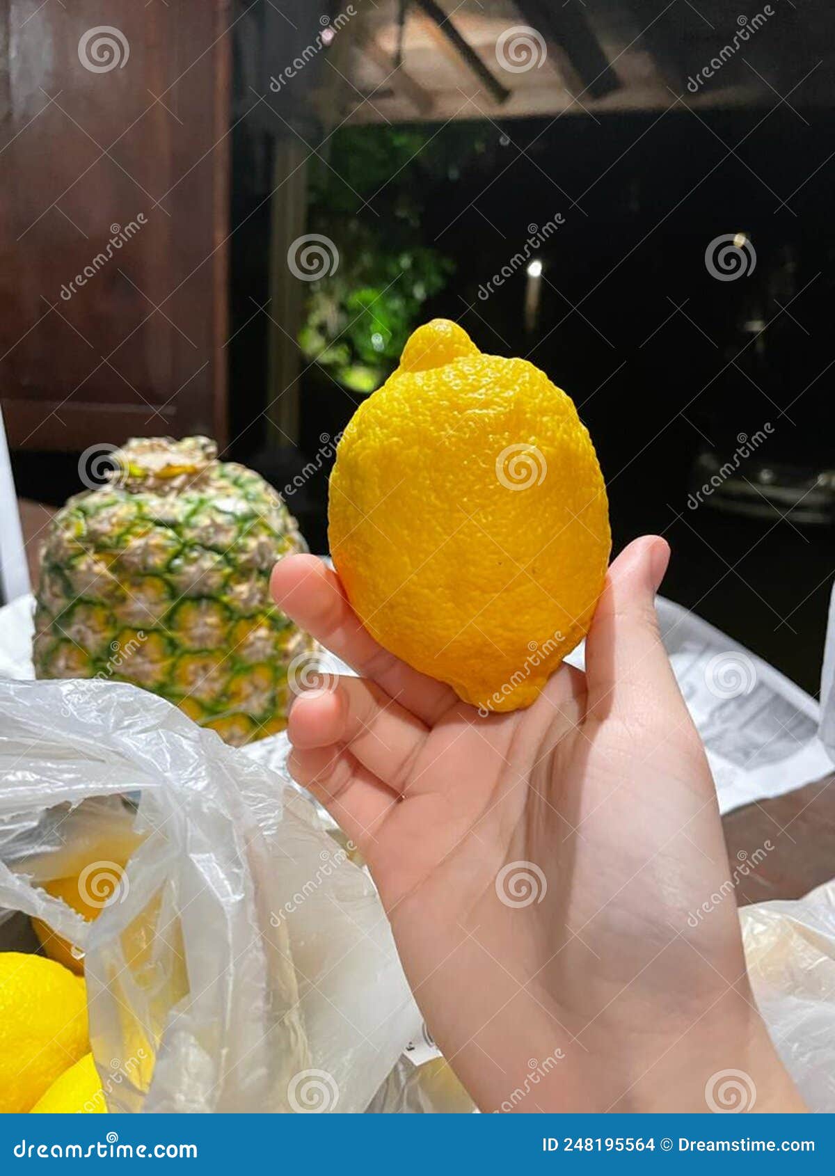 Bright Yellow Lemon at Night Stock Photo Image of produce, dish