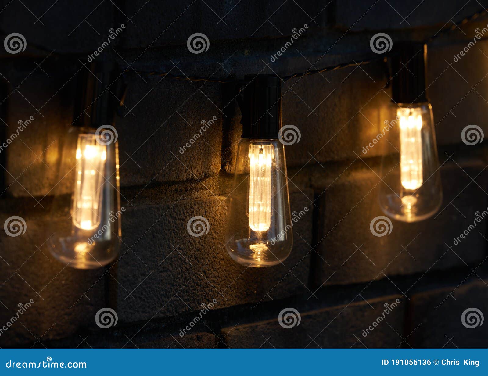 Bright Yellow Lights Hanging in the Night Garden Stock Photo Image of