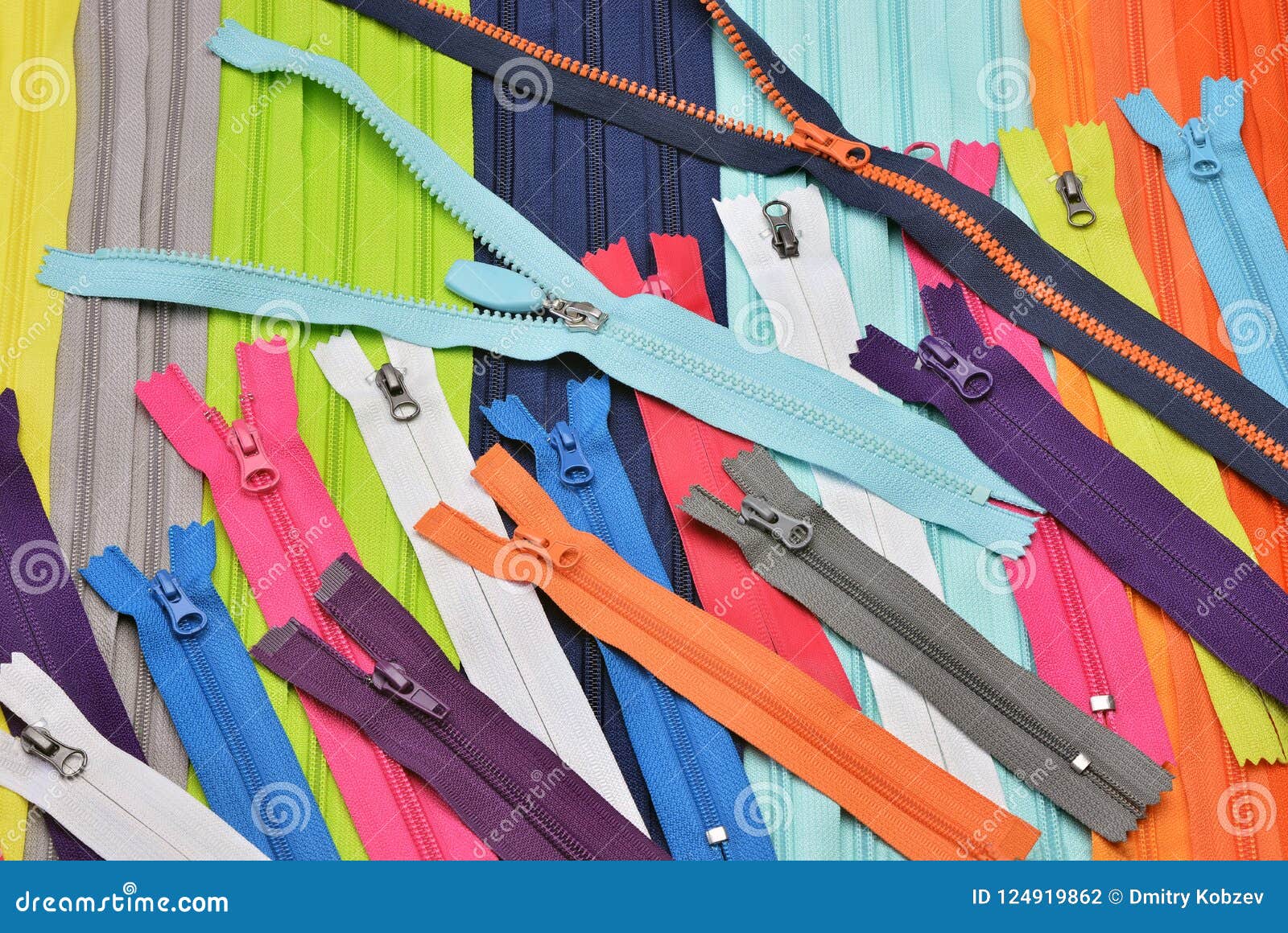 Bright Zipper of Different Colors in the Textile Industry Stock Photo ...