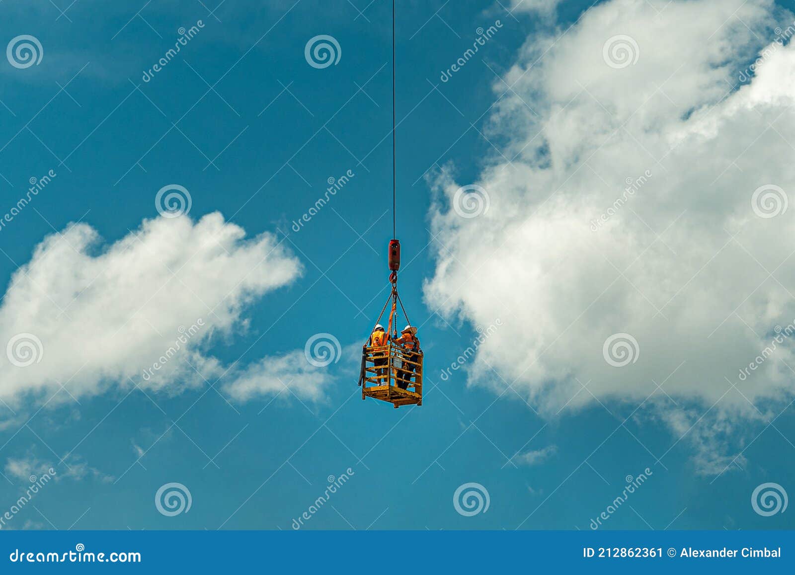 Brisbane, Australia Construction Workers Being Lifted in a Cage by a