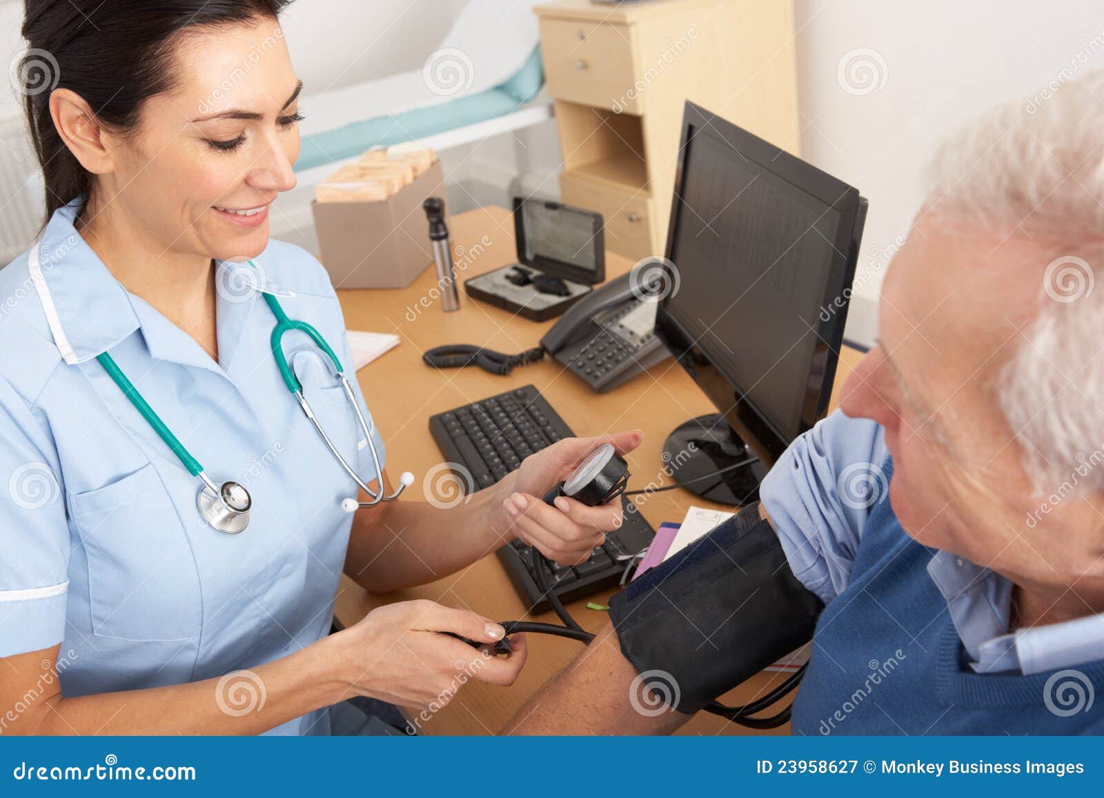 british nurse taking senior man's blood pressure