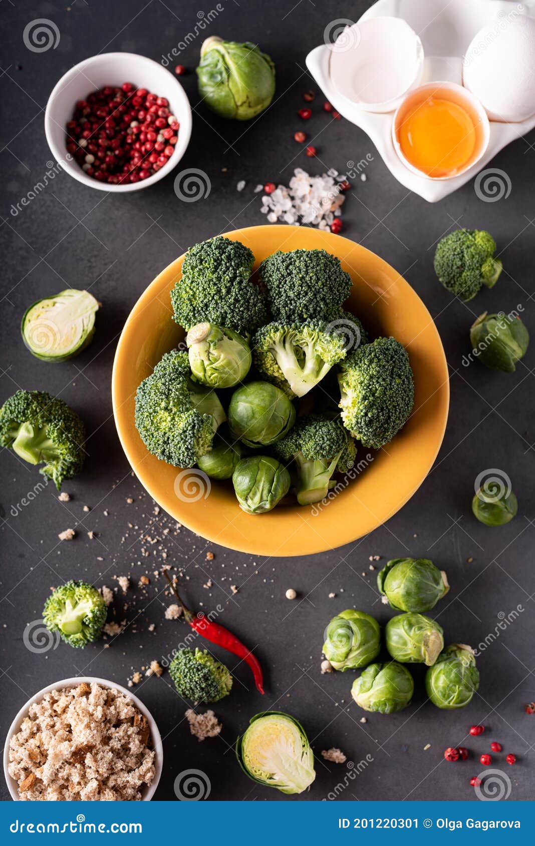 Broccoli and Brussels Sprouts with Egg and Bread Crumbs on a Gray Table