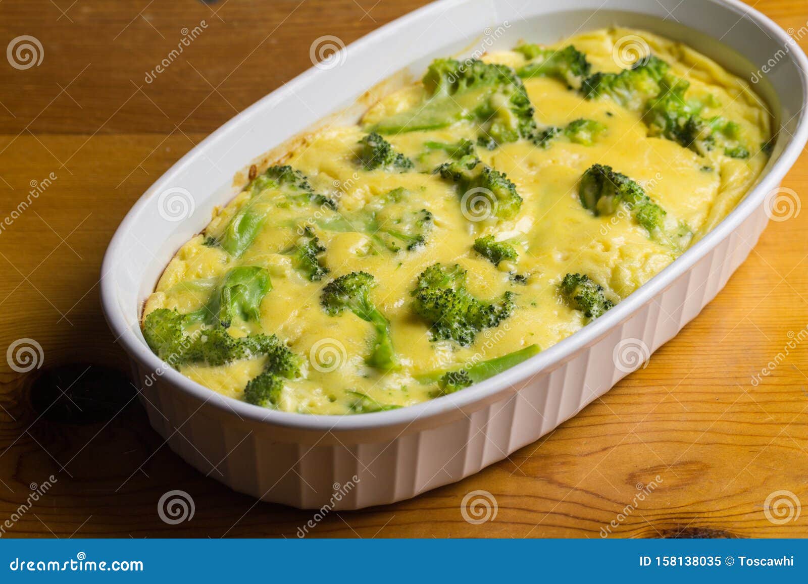 Broccoli Egg and Cheese Baked Casserole Dish on Brown Wooden Table