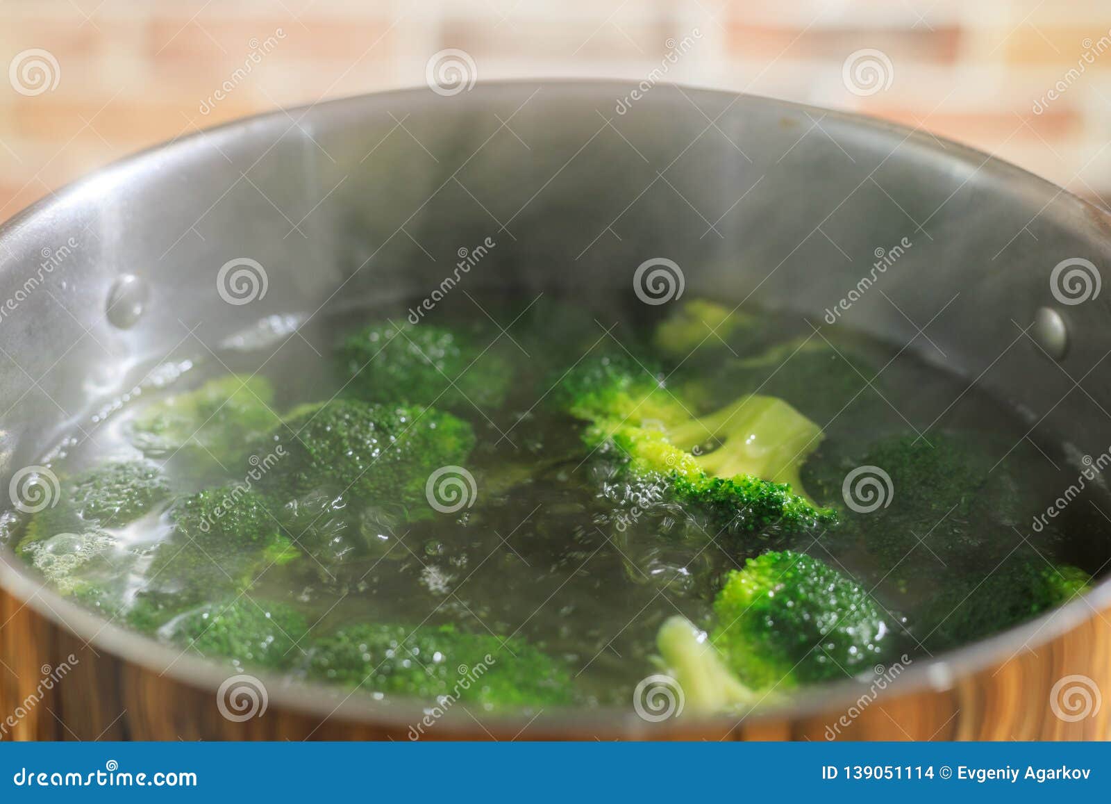 Broccoli into Saucepan in Boiling Water, Closeup View Stock Photo