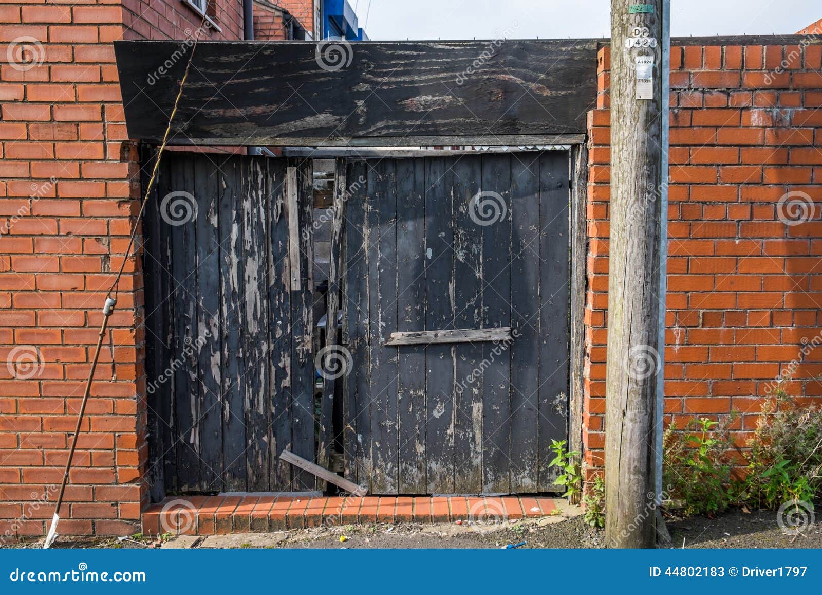 A Broken Back Gate Protecting a Property Stock Image Image of home