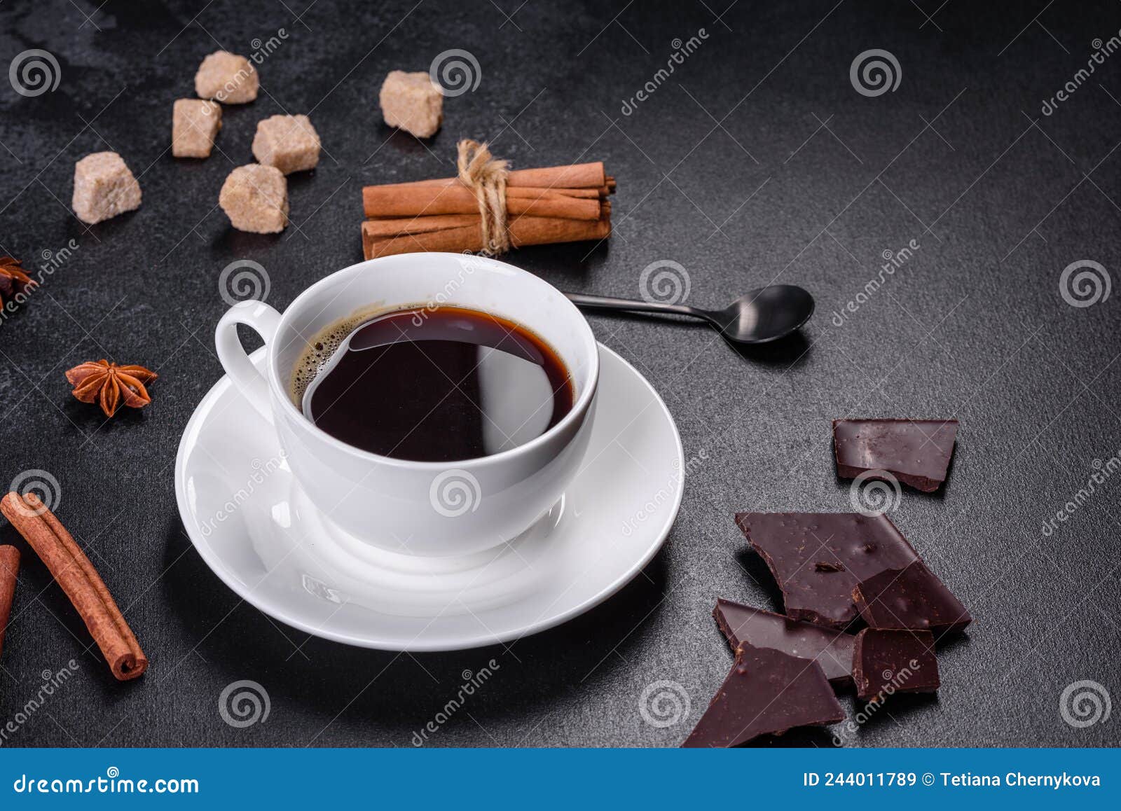 Broken Black Chocolate Pieces with Star Anise and Cinnamon Stock Image