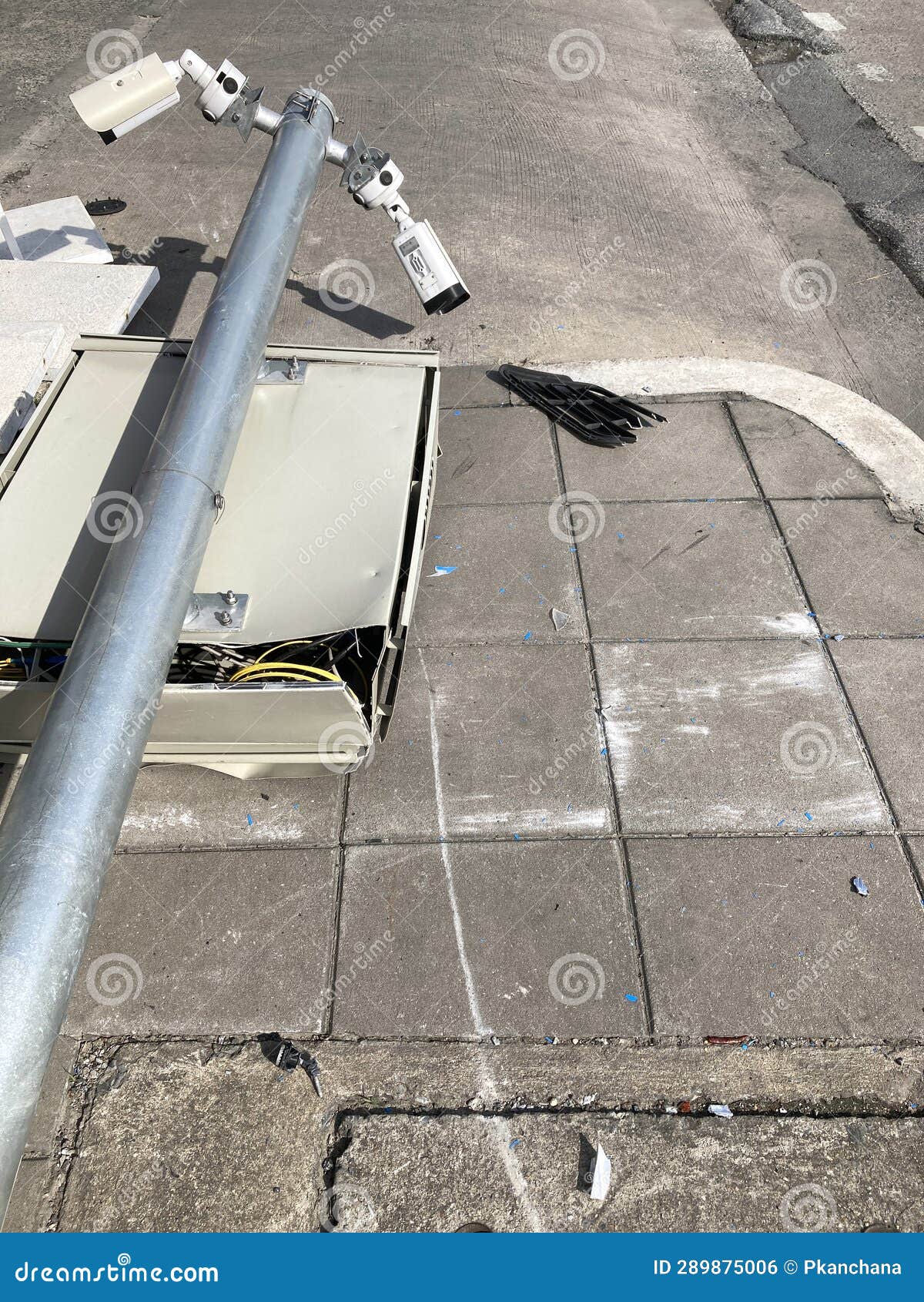 Broken CCTV Camera on the Footpath by Car Accident Stock Photo Image
