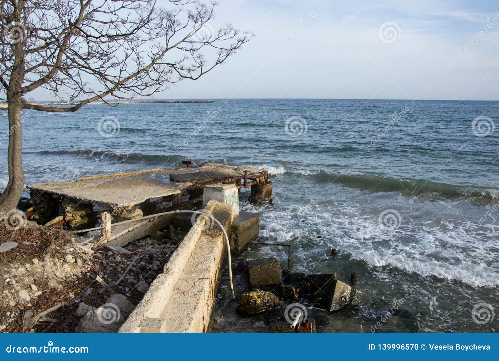 View of Broken Concrete Pier in the Sea, Coastal Destruction with ...