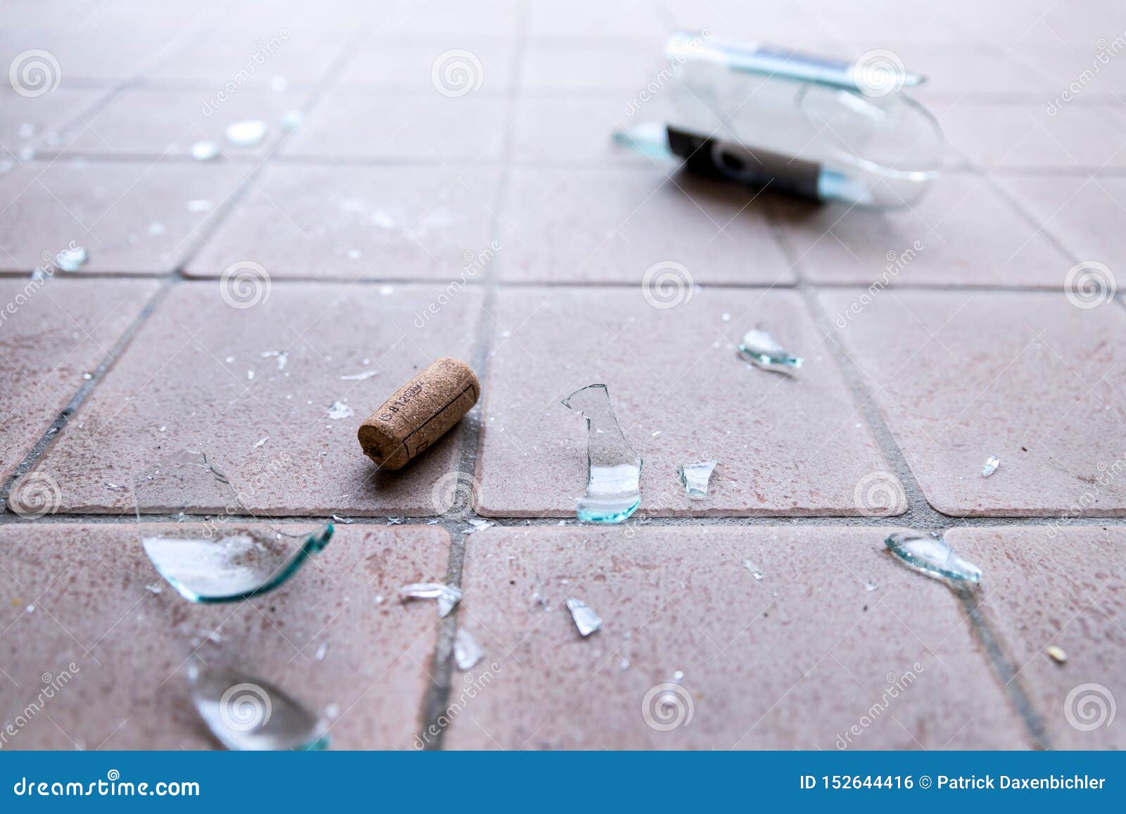broken glass on the floor, alcohol abuse