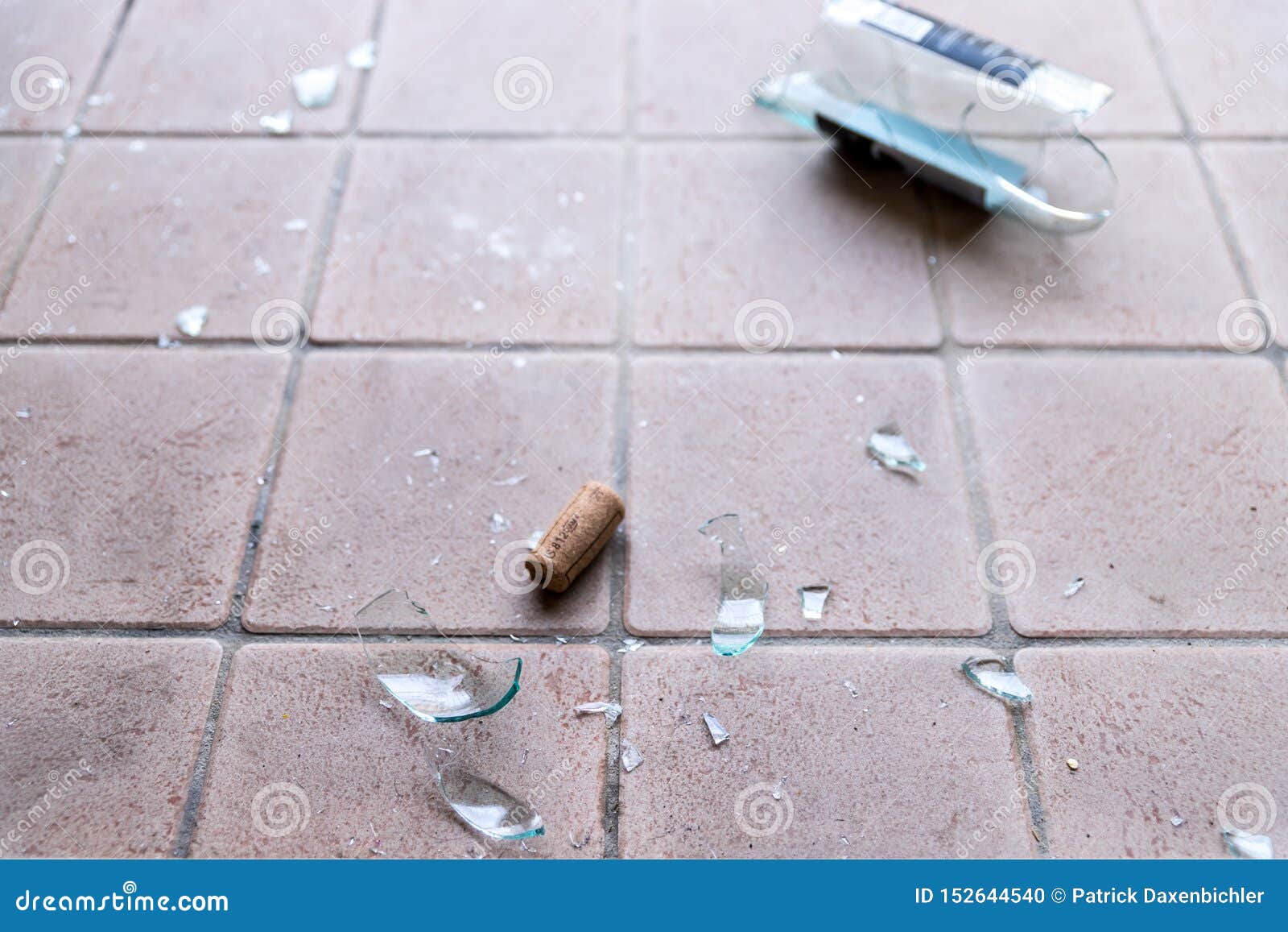 broken glass on the floor, alcohol abuse