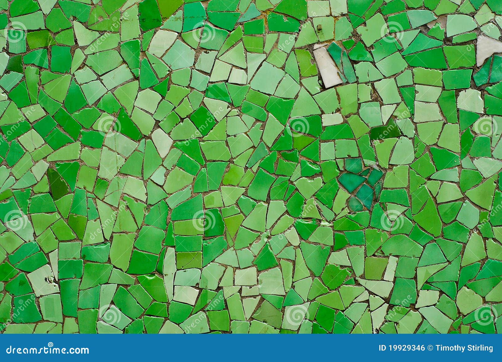 broken green wall tiles