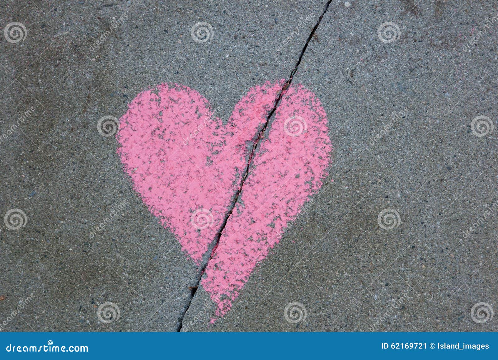 broken heart drawn on sidewalk with chalk