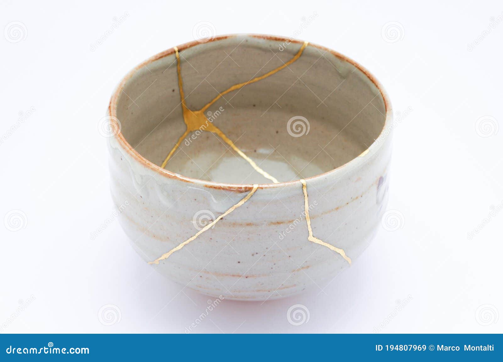 broken japanese handmade bowl restored with the antique japanese kintsugi real gold technique