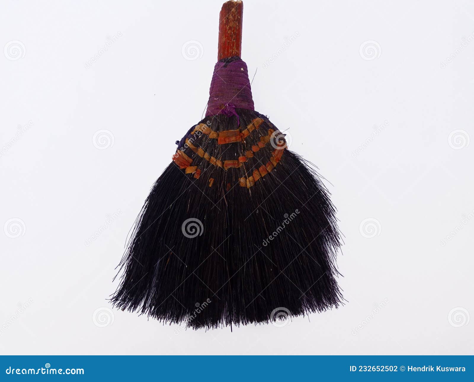 A Broken Little Old Broom Isolated on White Background Stock Photo
