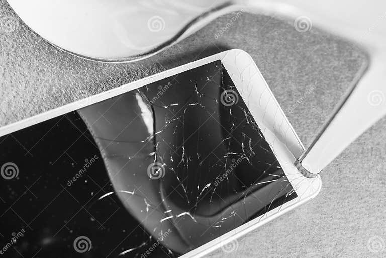 Broken Mobile Phone on a Pink Background Stock Image Image of device