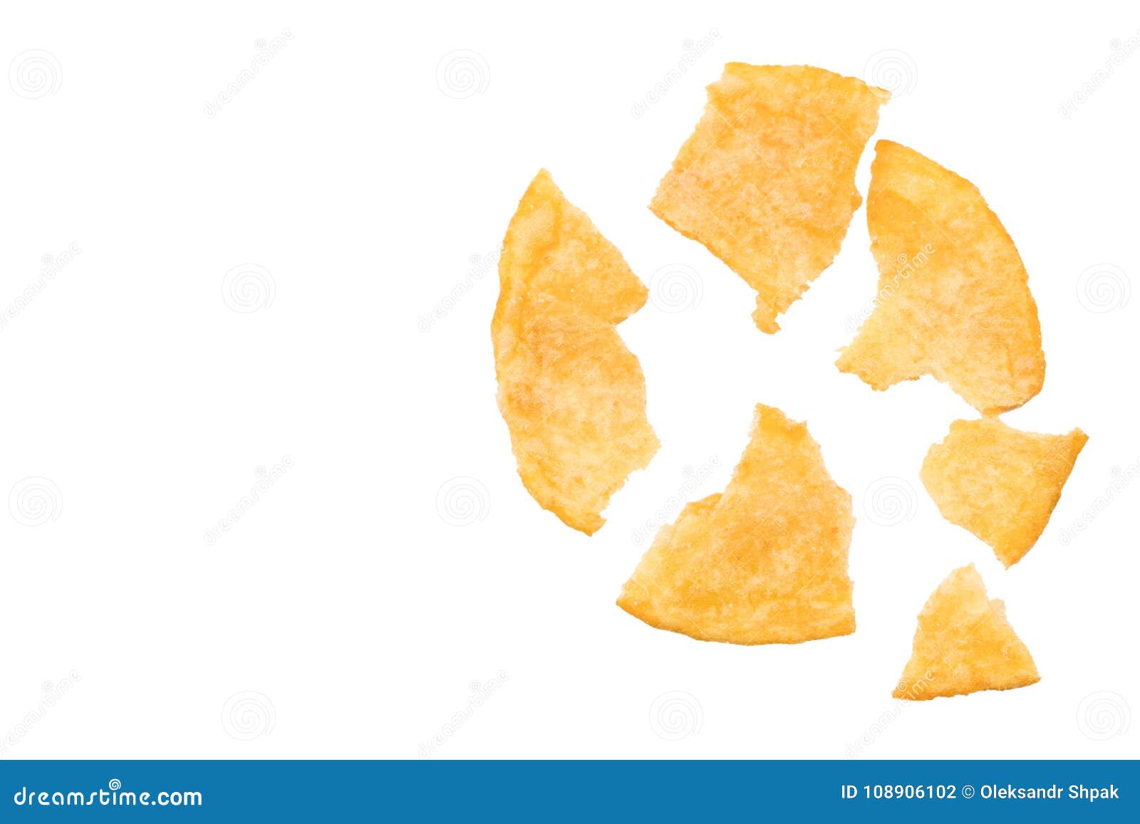 broken potato chips  on white background, top view