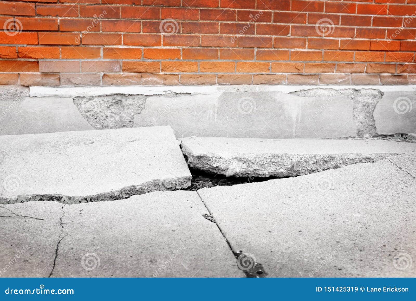 broken sidewalk concrete dangerous cracked