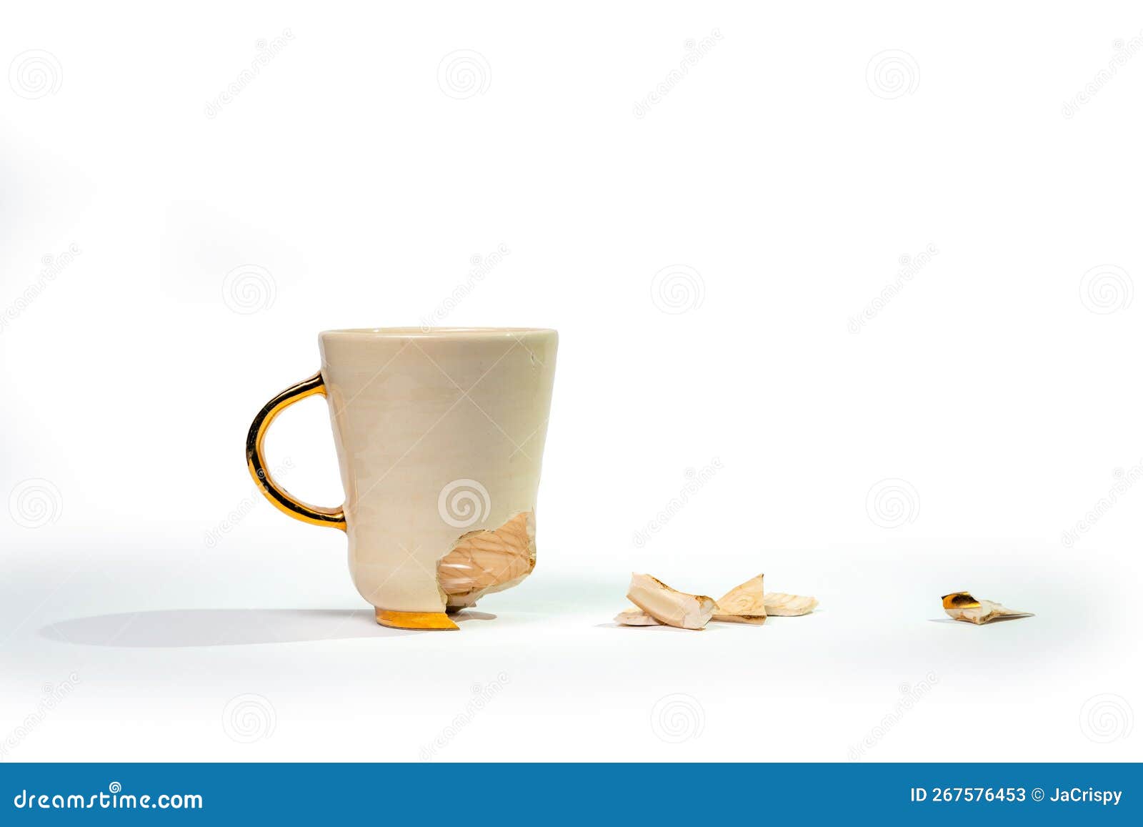 Broken Tea Cup Isolated on White Background. Cracked Coffee Mug and Fragile Ceramic Pieces Stock