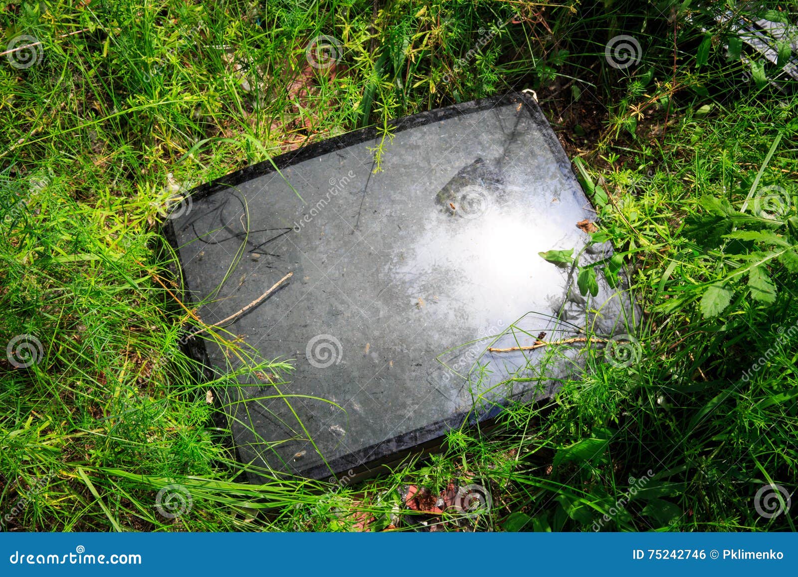 Broken Television Tube in Green Grass Stock Photo Image of scrap