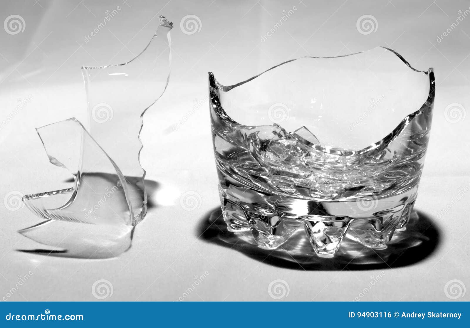 Broken Whiskey Glass with Shrapnel Stock Photo Image of liquid