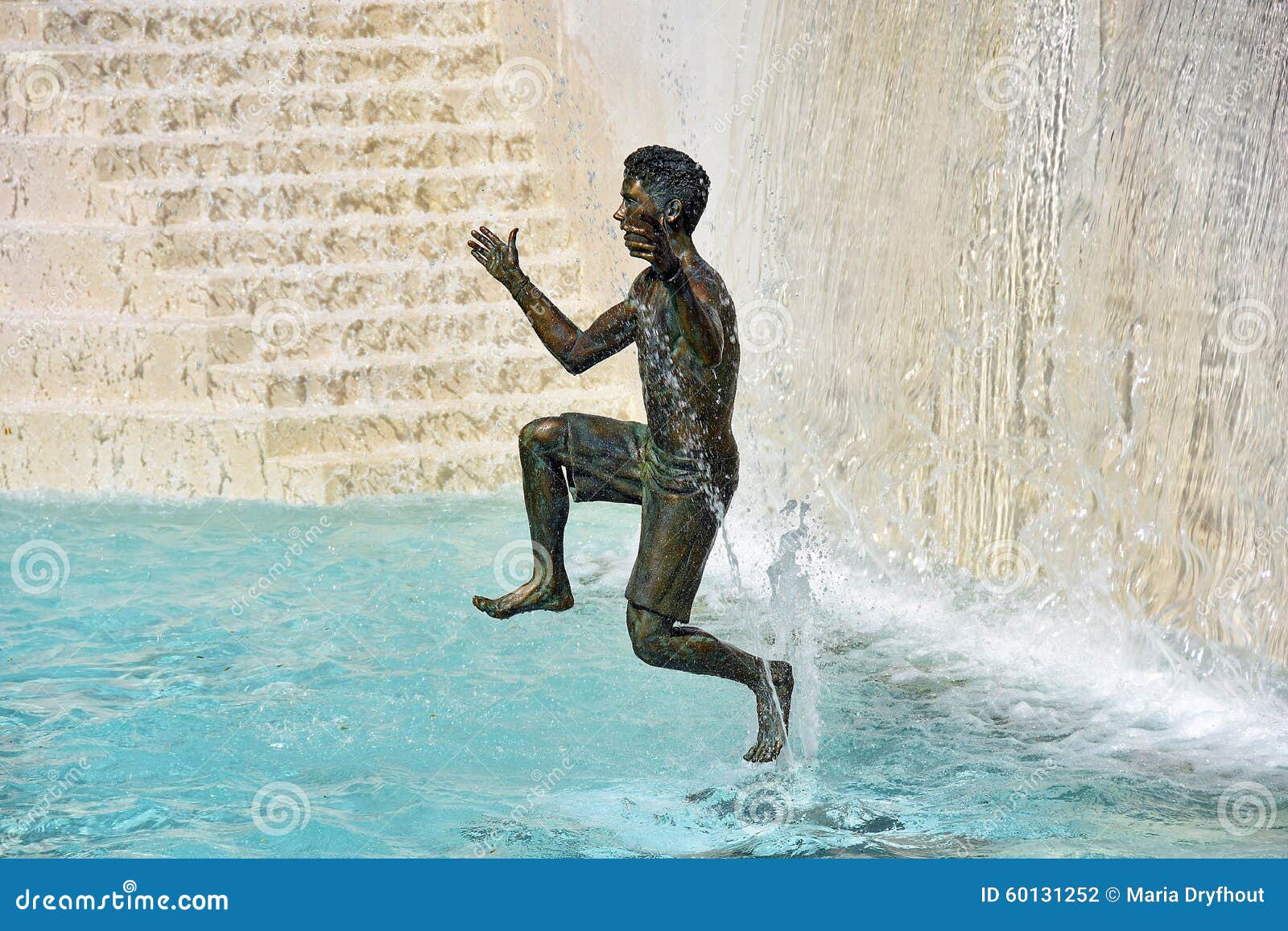 Bronze Boy Statue in Fountain Editorial Photography Image of wall