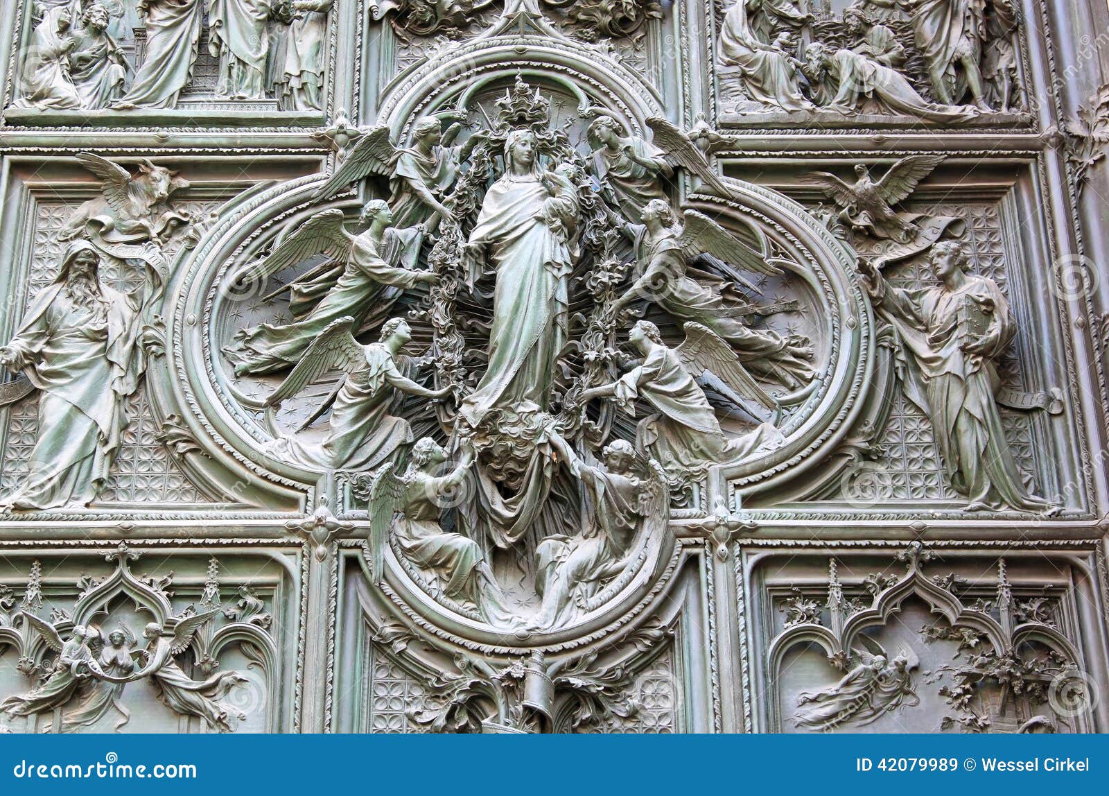 bronze door of the milan cathedral, italy