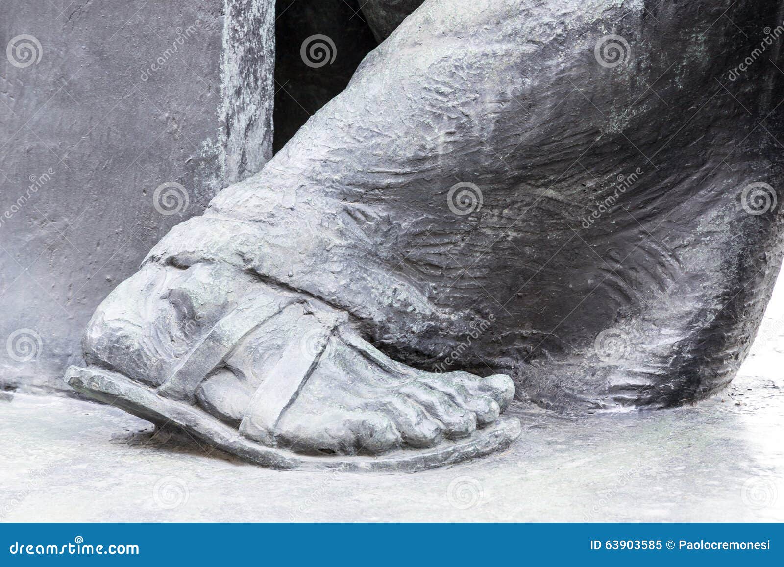 Bronze feet of a statue stock image. Image of middle 63903585