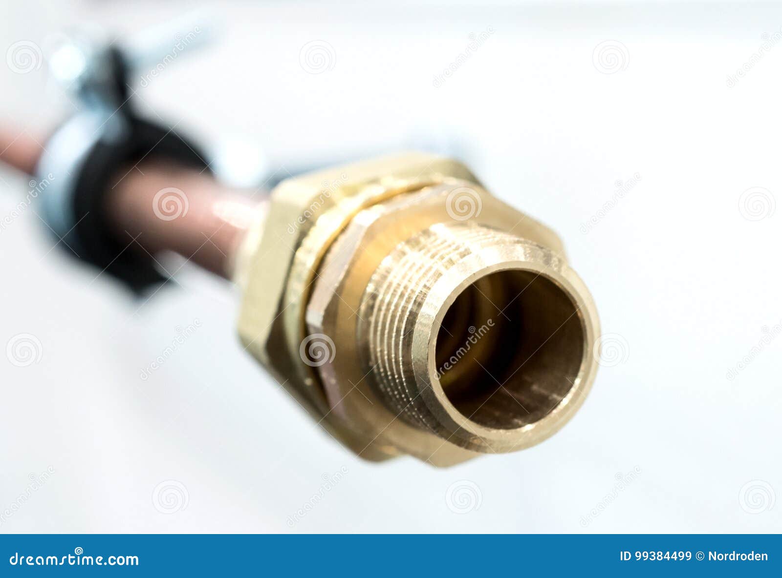 Bronze Fitting is Screwed Onto a Copper Pipe. Stock Image Image of